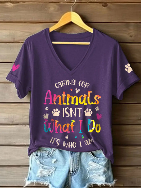 Women's caring for animals isn't what I do it's who I am V-neck T-shirts
