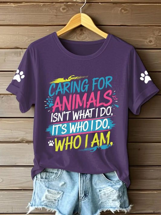Women's caring for animals isn't what I do it's who I am T-shirts