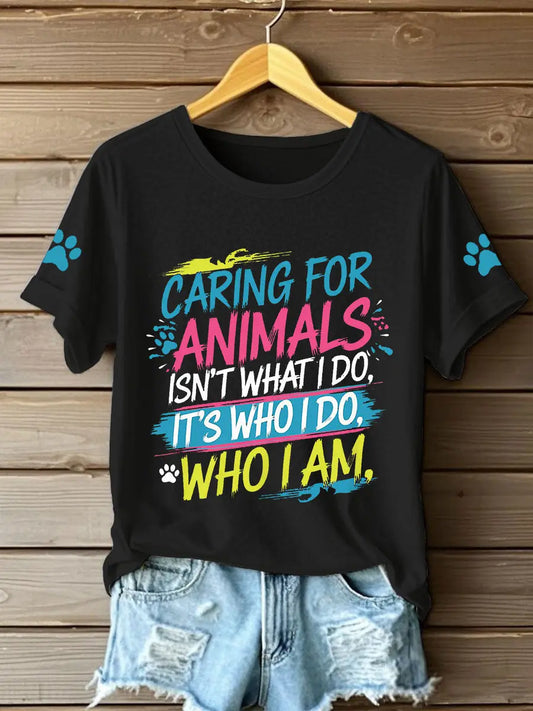 Women's caring for animals isn't what I do it's who I am T-shirts