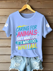 Women's caring for animals isn't what I do it's who I am T-shirts
