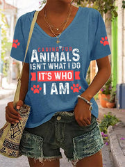 Women's caring for animals isn't what I do it's who I am V-neck T-shirts