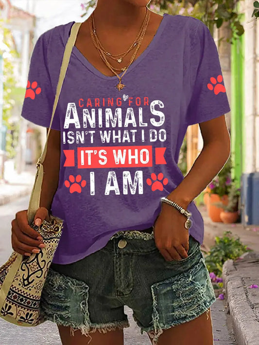 Women's caring for animals isn't what I do it's who I am V-neck T-shirts