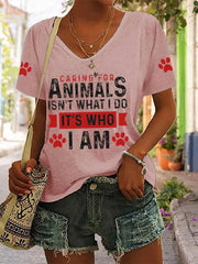 Women's caring for animals isn't what I do it's who I am V-neck T-shirts