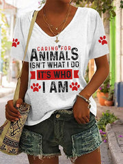 Women's caring for animals isn't what I do it's who I am V-neck T-shirts
