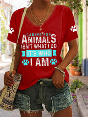 Women's caring for animals isn't what I do it's who I am V-neck T-shirts