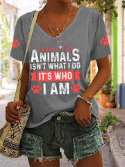 Women's caring for animals isn't what I do it's who I am V-neck T-shirts