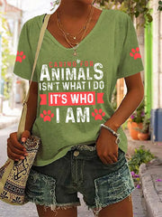 Women's caring for animals isn't what I do it's who I am V-neck T-shirts