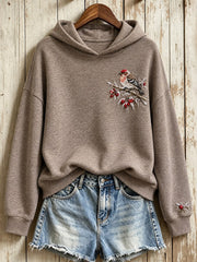 Women's Snowy Winter Common Redpoll On Branch Print Hoodie gracestitchs